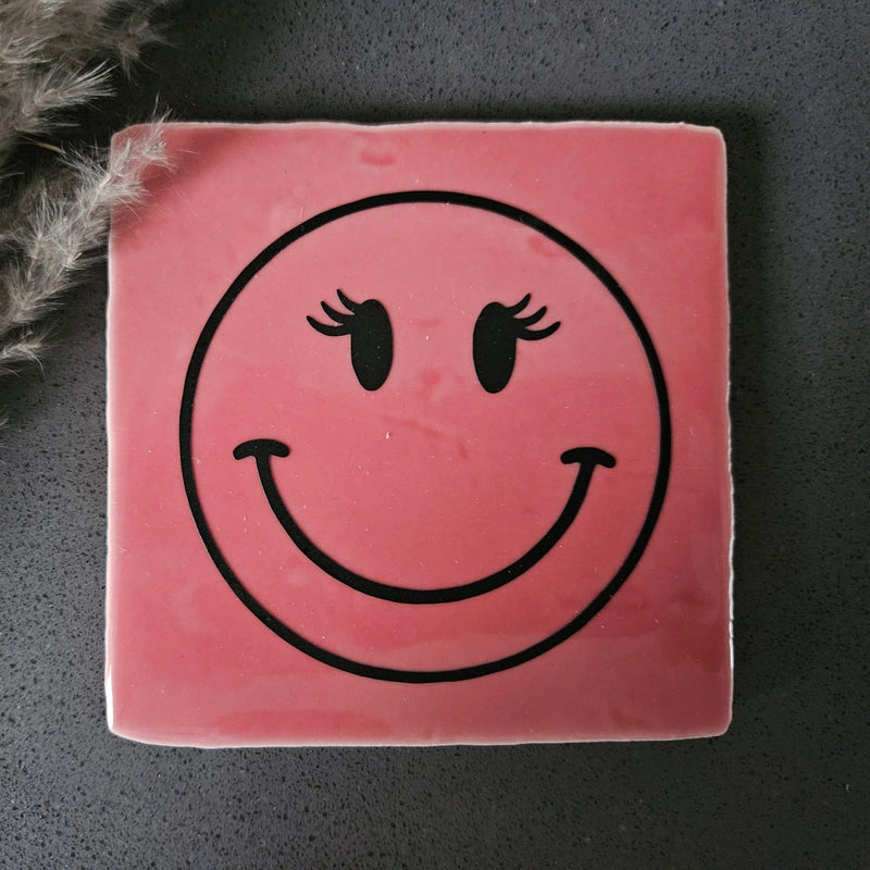 Tegeltje roze smiley